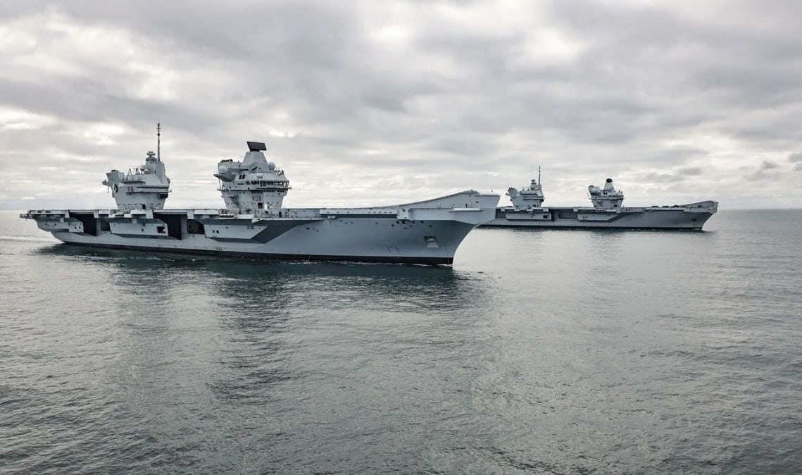 HMS Prince of Wales alongside HMS Queen Elizabeth