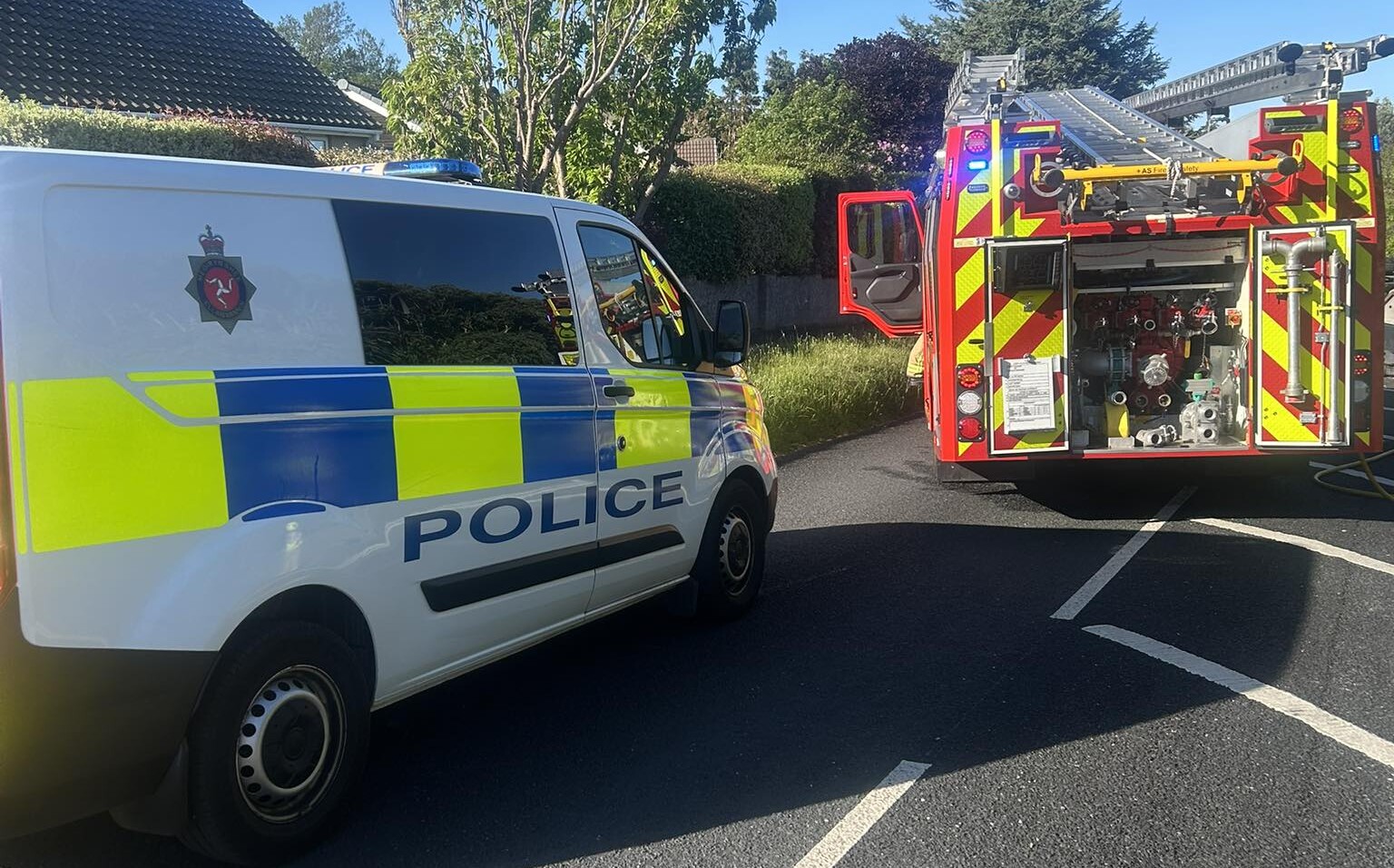Emergency services at the scene of the crash in Onchan