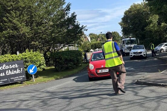 Tesco staff turn cars away at the store's entrance